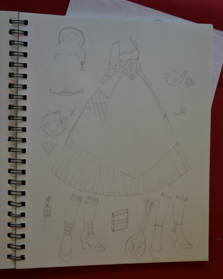 I changed the design of the tiara, because I wanted it to match the motifs I had designed for the pattern that will eventually go on the skirt. That meant altering the tiara accordingly. I really like the new design.