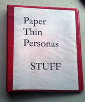 The red binder is home to all important blog documents. 