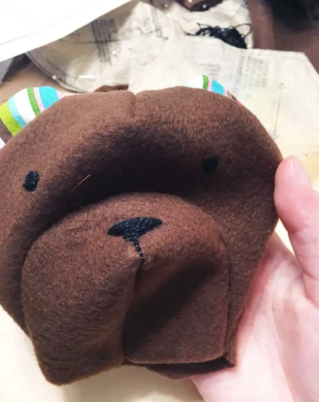 A photograph of the embroidery on the face of my teddy bear head. 